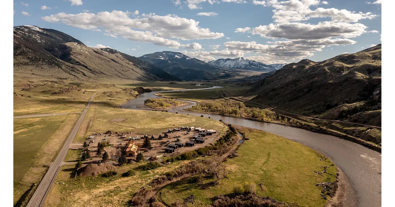 Aerial view of Auster at Dome Mountain lodge and cabins along the Yellowstone River in Paradise Valley, Montana